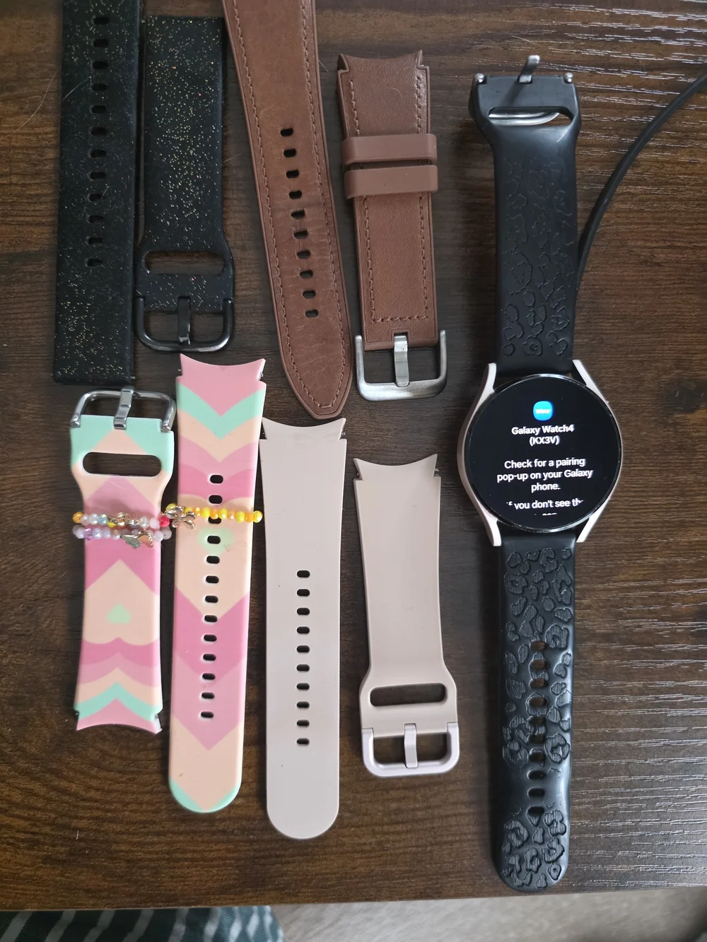 Samsung Galaxy Watch 4 with Black Cheetah Strap and 4 Extra Bands